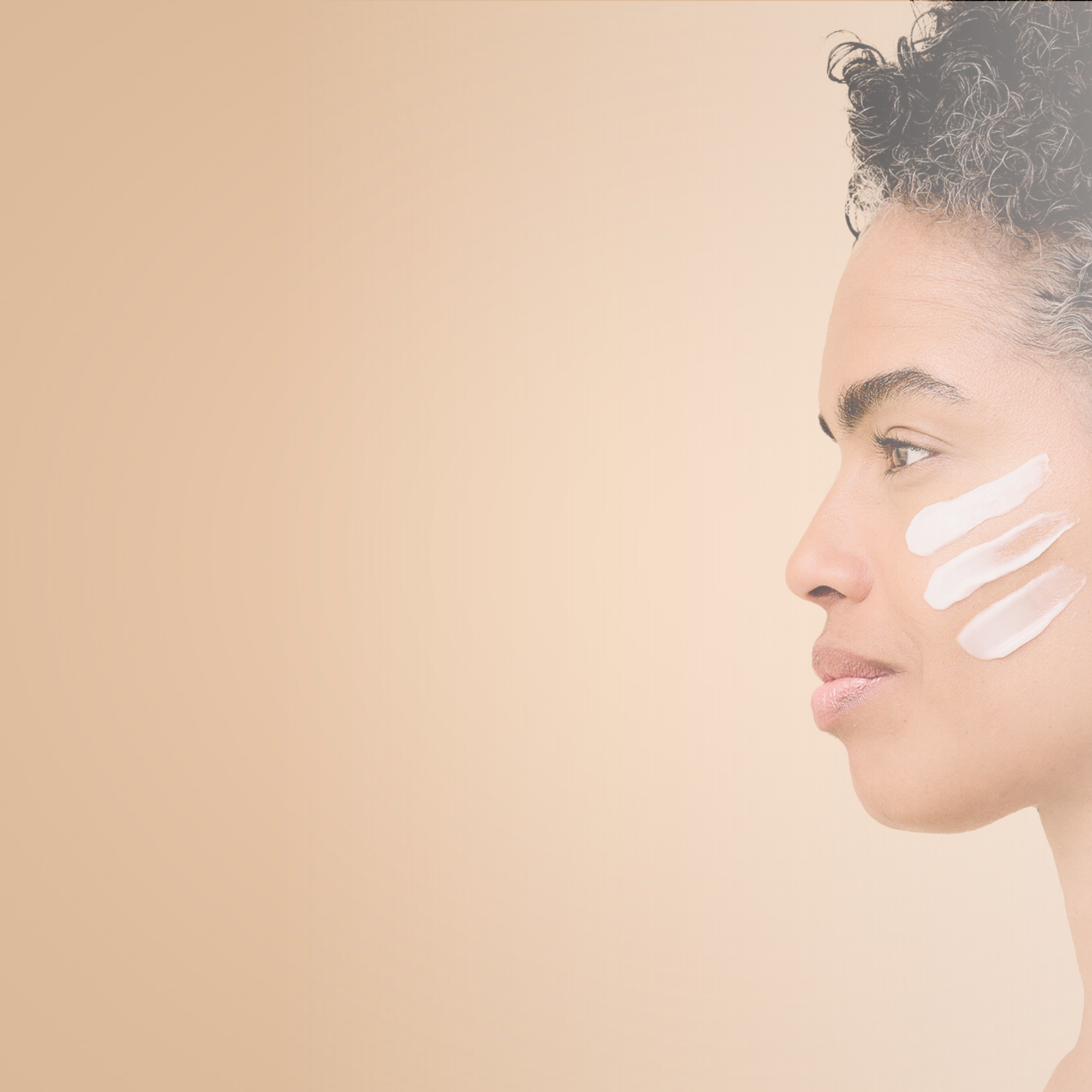 An image of a Lady with skincare cream on the face on a cream fade background.